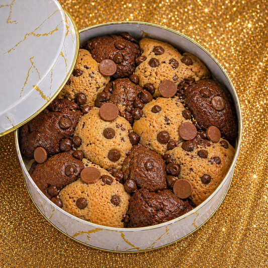 A golden chocolate chip cookie layered with a rich, fudgy brownie —
baked together into one seamless, gooey experience.
