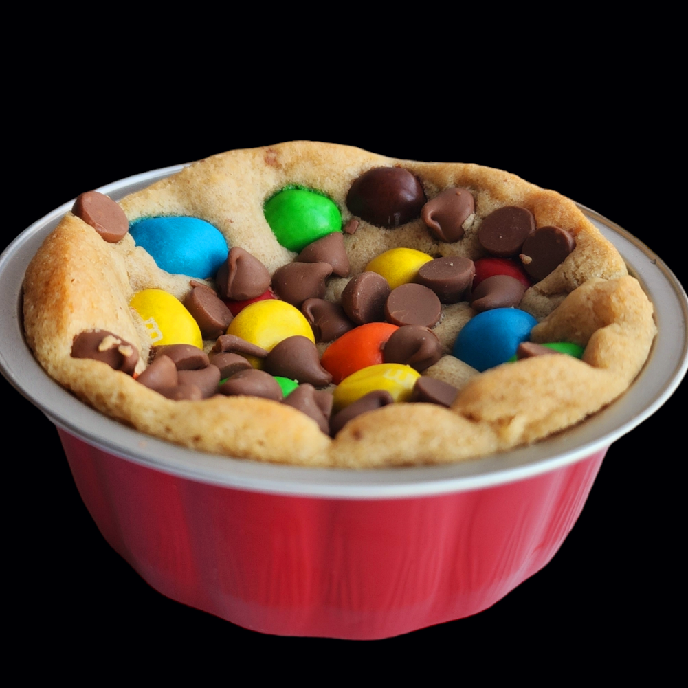 M & M loaded skillet cookie. Skillet baked cookie from Skillet cookie company. Order online skillet baked cookies Canada wide delivery. Toronto cookies.